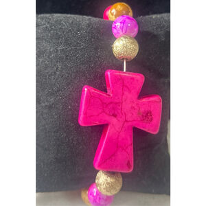 Pink & Brown Tan Cross Bracelet #

2033